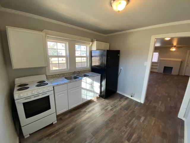 kitchen with white electric range oven, sink, white cabinetry, black refrigerator, and dark hardwood / wood-style floors