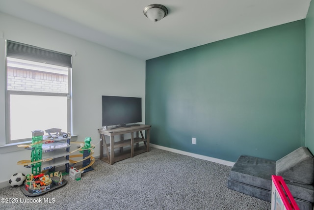 7406 9th St, Lubbock, TX 79416 - sitting room with carpet flooring and baseboards