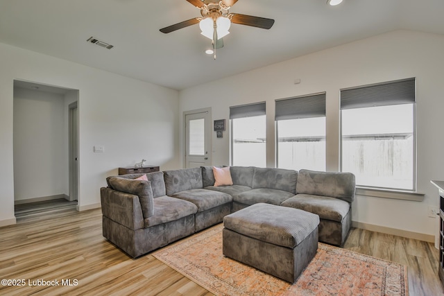 7406 9th St, Lubbock, TX 79416 - living room featuring light wood-style flooring, baseboards, a ceiling fan, and recessed lighting