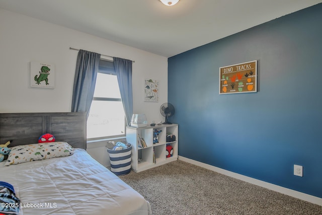 7406 9th St, Lubbock, TX 79416 - bedroom featuring carpet floors and baseboards