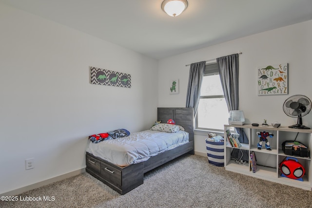7406 9th St, Lubbock, TX 79416 - carpeted bedroom featuring baseboards