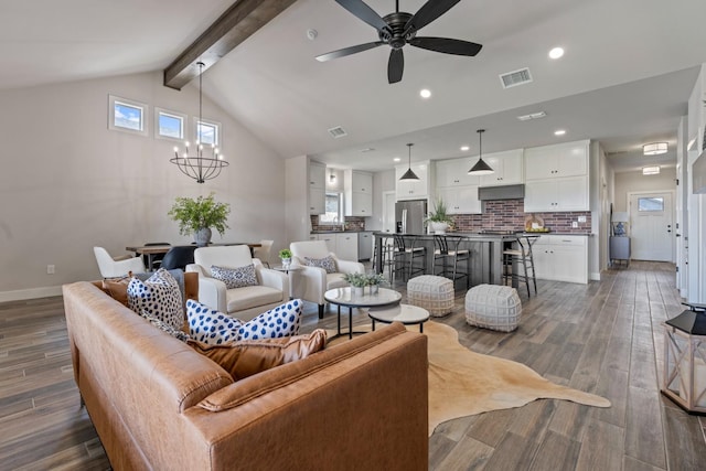 living room featuring high vaulted ceiling, dark hardwood / wood-style flooring, ceiling fan with notable chandelier, and beam ceiling