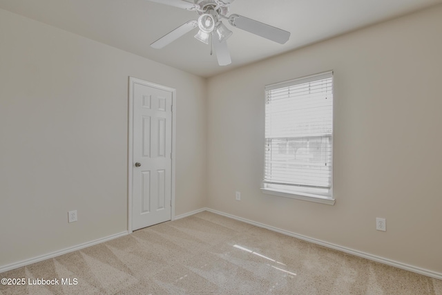 6801 36th St, Lubbock, TX 79407 - empty room featuring carpet, baseboards, and ceiling fan