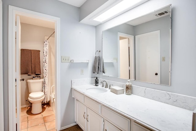 bathroom with tile patterned flooring, vanity, curtained shower, and toilet