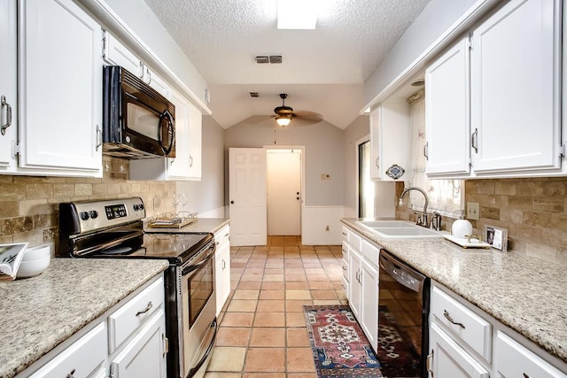 kitchen featuring lofted ceiling, sink, ceiling fan, black appliances, and white cabinets