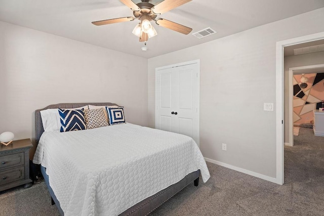 carpeted bedroom featuring a closet and ceiling fan