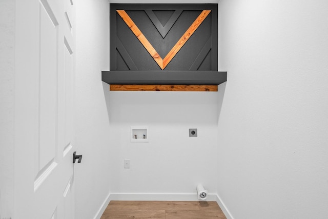 washroom featuring washer hookup, wood-type flooring, and electric dryer hookup