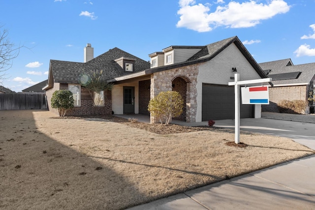 view of front of home featuring a garage