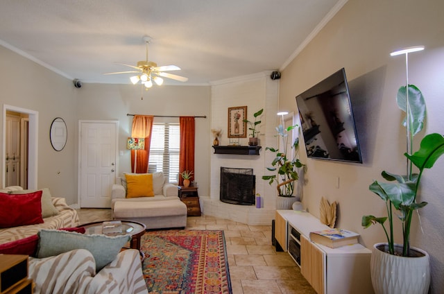 living room featuring a ceiling fan, crown molding, and a brick fireplace