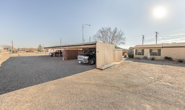 view of car parking featuring a carport