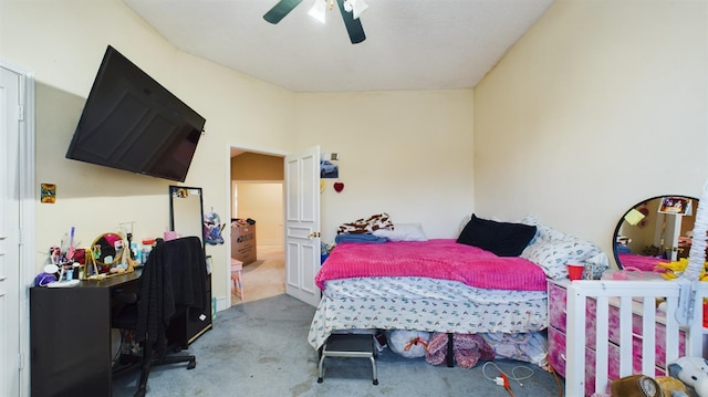 bedroom featuring ceiling fan and carpet floors