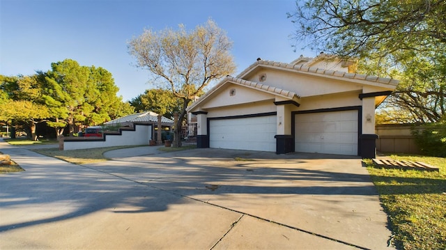 view of front of property featuring a garage