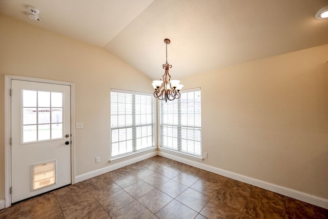 doorway to outside featuring tile patterned floors, lofted ceiling, and a notable chandelier