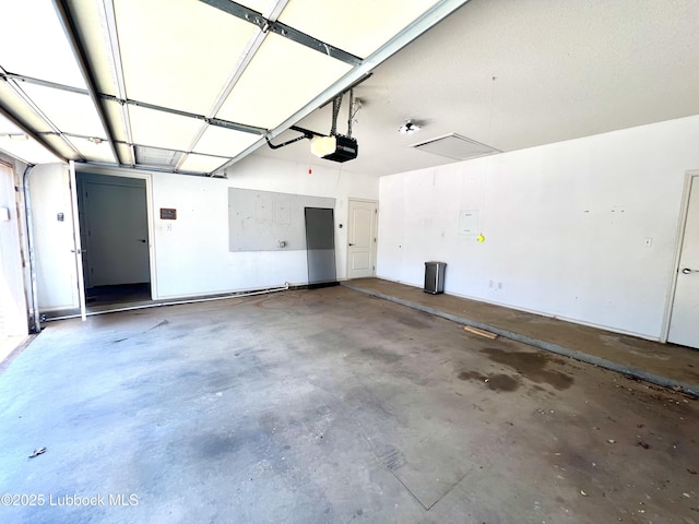 9802 Toledo Ave, Lubbock, TX 79424 - garage featuring a garage door opener