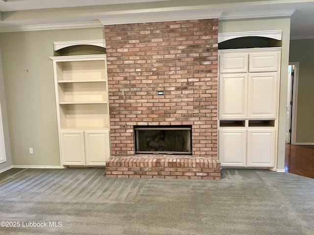 9802 Toledo Ave, Lubbock, TX 79424 - unfurnished living room with carpet flooring, crown molding, and a brick fireplace