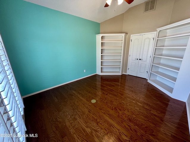 9802 Toledo Ave, Lubbock, TX 79424 - unfurnished bedroom with vaulted ceiling, wood finished floors, ceiling fan, and a closet