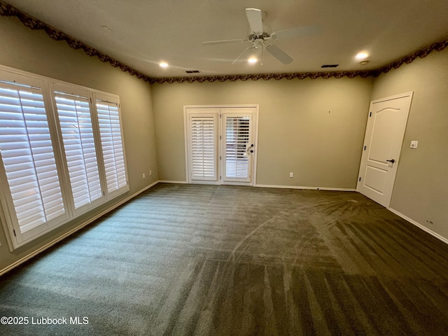 9802 Toledo Ave, Lubbock, TX 79424 - spare room with ceiling fan, carpet floors, and recessed lighting