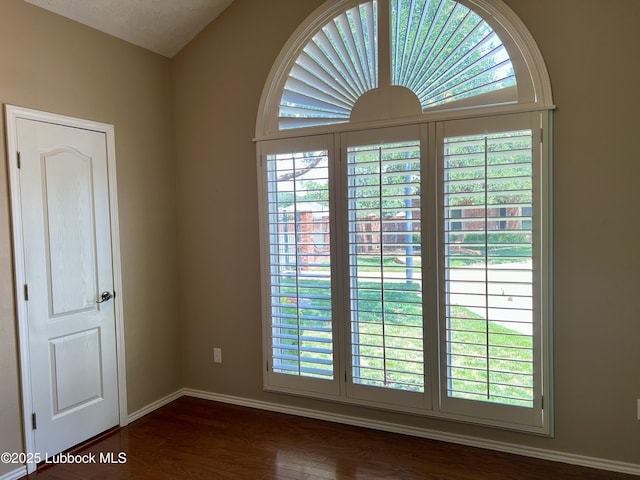 9802 Toledo Ave, Lubbock, TX 79424 - interior space featuring dark wood finished floors and baseboards