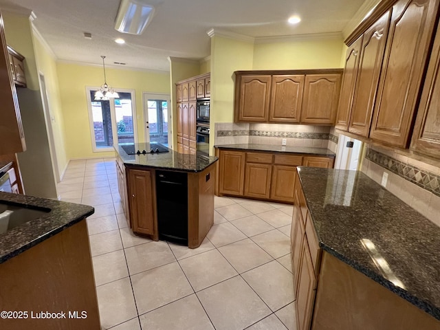 9802 Toledo Ave, Lubbock, TX 79424 - kitchen with black appliances, crown molding, a chandelier, decorative backsplash, and dark stone countertops