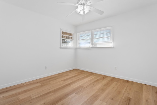 spare room with ceiling fan and light hardwood / wood-style floors