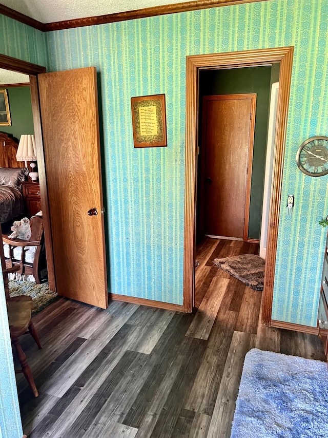 hall with dark hardwood / wood-style flooring