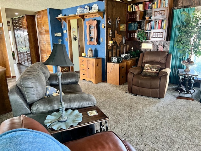 living room with carpet and a healthy amount of sunlight