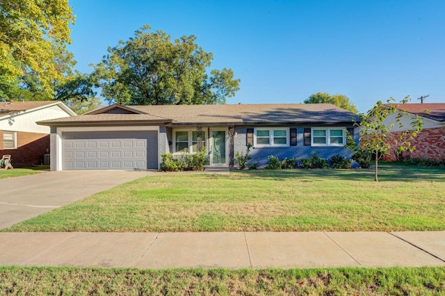 single story home with a garage and a front yard