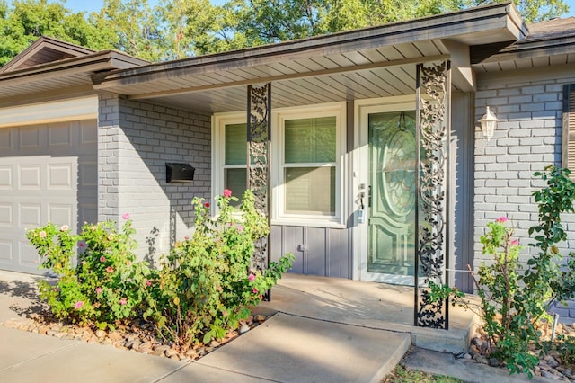 property entrance featuring a garage