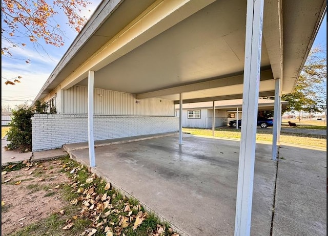 exterior space with a carport