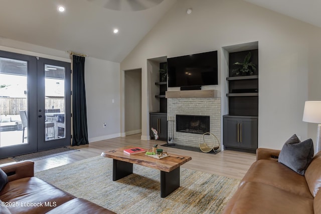 10907 Vicksburg Ave, Lubbock, TX 79424 - living area featuring light wood-style flooring, high vaulted ceiling, french doors, recessed lighting, and ceiling fan