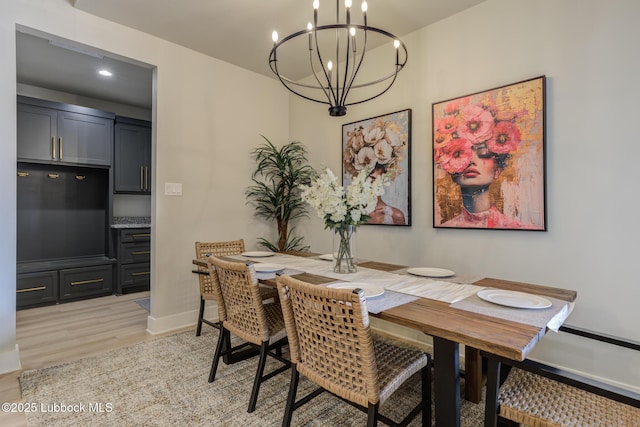10907 Vicksburg Ave, Lubbock, TX 79424 - dining space featuring a chandelier, light wood-type flooring, recessed lighting, and baseboards