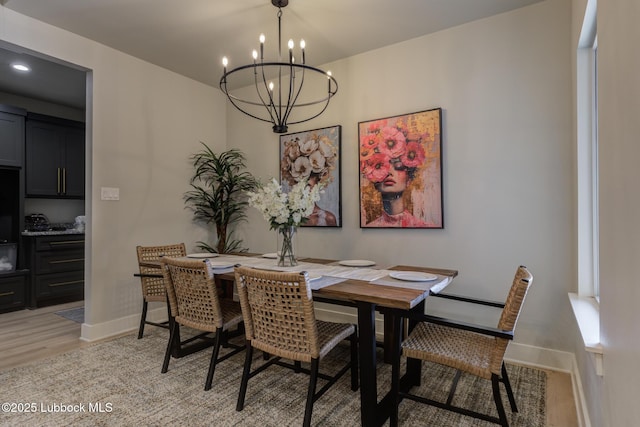 10907 Vicksburg Ave, Lubbock, TX 79424 - dining area featuring a chandelier, light wood-style flooring, baseboards, and recessed lighting