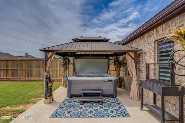 10907 Vicksburg Ave, Lubbock, TX 79424 - view of patio featuring a gazebo and a hot tub