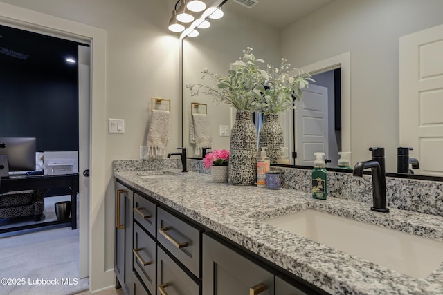10907 Vicksburg Ave, Lubbock, TX 79424 - bathroom featuring double vanity