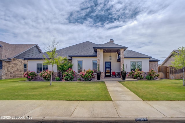 10907 Vicksburg Ave, Lubbock, TX 79424 - view of front of property featuring stucco siding, a chimney, and roof with shingles