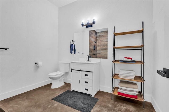 full bath with baseboards, toilet, concrete floors, and vanity