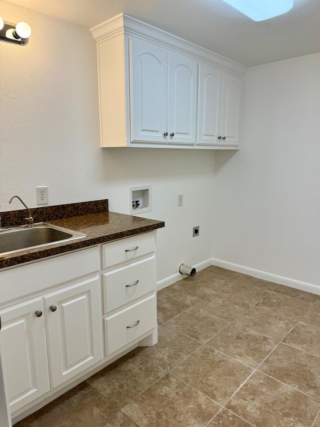 laundry room with sink, hookup for a washing machine, cabinets, and hookup for an electric dryer