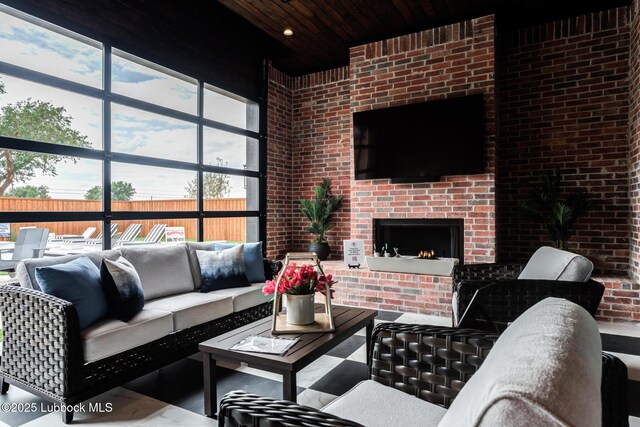 4510 Zadar Ave, Lubbock, TX 79407 - living room with brick wall, a fireplace, and wooden ceiling