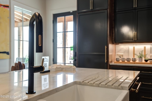 4510 Zadar Ave, Lubbock, TX 79407 - kitchen with dark cabinetry