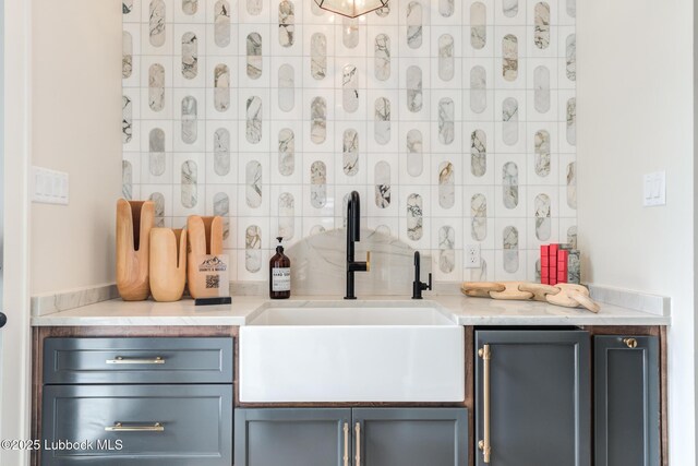 4510 Zadar Ave, Lubbock, TX 79407 - bar featuring a sink and tasteful backsplash
