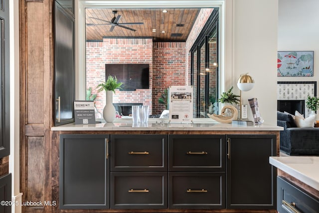 4510 Zadar Ave, Lubbock, TX 79407 - bar with wood ceiling and a ceiling fan