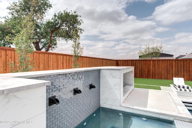 4510 Zadar Ave, Lubbock, TX 79407 - view of swimming pool featuring a fenced backyard