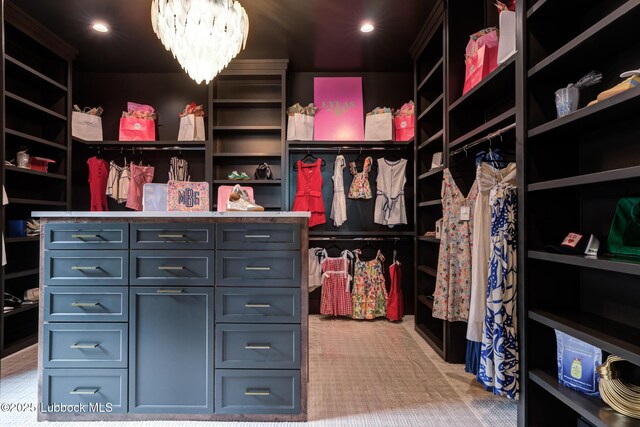 4510 Zadar Ave, Lubbock, TX 79407 - spacious closet with a chandelier and light colored carpet