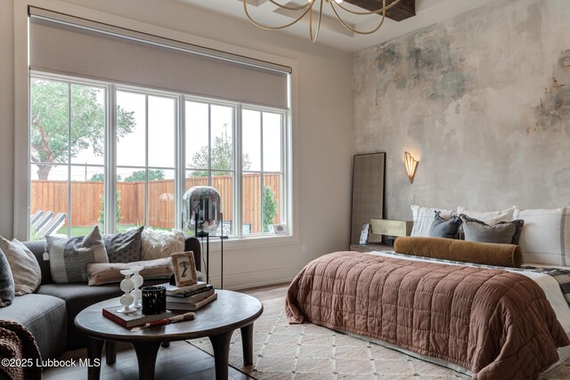 4510 Zadar Ave, Lubbock, TX 79407 - bedroom with a chandelier