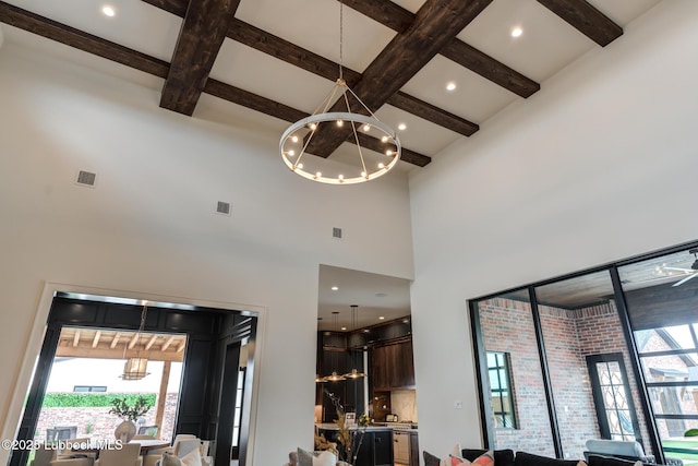 4510 Zadar Ave, Lubbock, TX 79407 - living area with a chandelier, beamed ceiling, a high ceiling, and coffered ceiling