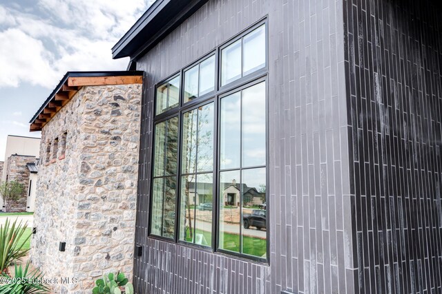 4510 Zadar Ave, Lubbock, TX 79407 - view of home's exterior featuring stone siding