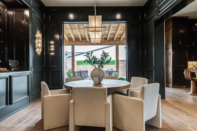 4510 Zadar Ave, Lubbock, TX 79407 - dining room featuring a decorative wall and light wood-type flooring