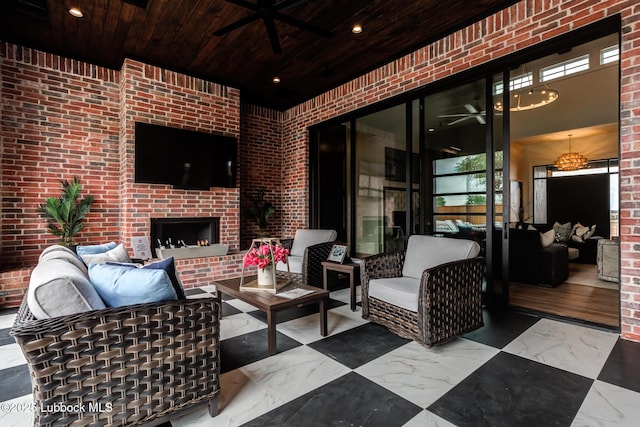 4510 Zadar Ave, Lubbock, TX 79407 - view of patio / terrace featuring an outdoor living space with a fireplace and ceiling fan
