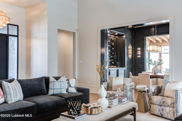 4510 Zadar Ave, Lubbock, TX 79407 - living area featuring light wood finished floors and a towering ceiling