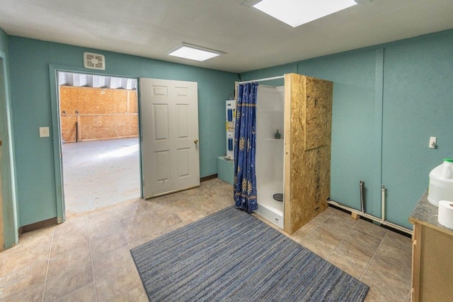 bathroom with vanity and curtained shower